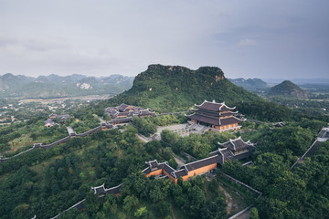 Ninh Binh, Vietnam - May 2019: aerial view from Bai Dinh stupa over Buddhist temple complex