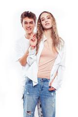 young pretty couple together posing cheerful isolated on white background, lifestyle people concept, happy boy and girl