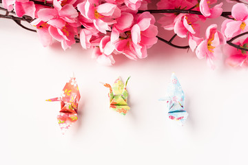 Japanese crane origami isolated against white background