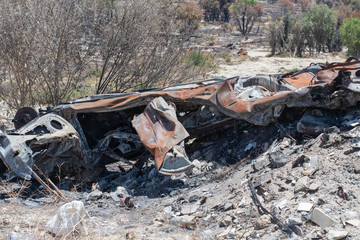 Abandoned car burnt in the bushfire