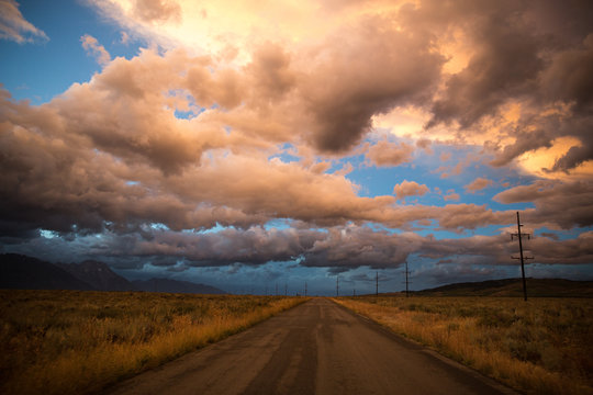 Dramatic clouds over road in Grand Teton National Park. 