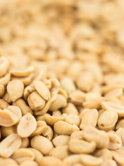 Roasted and salted Peanuts on vintage background