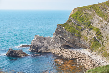 Fototapeta na wymiar Rock formations along the Jurassic Coast World Heritage Site near Lulworth in Dorset England United Kingdom UK