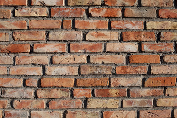 Wall of red brick - structure, bricklayer.