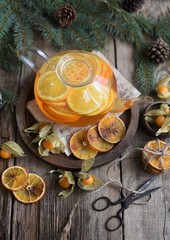 Winter tea with fresh  orange . Cup of orange tea. Oriental tea. orange tea.