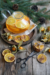 Winter tea with fresh  orange . Cup of orange tea. Oriental tea. orange tea.