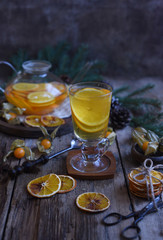 Winter tea with fresh  orange . Cup of orange tea. Oriental tea. orange tea.