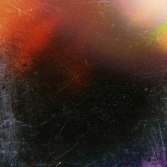 Grunge style scratched background with dark color tone.
