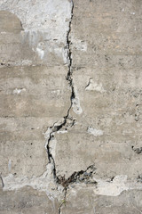 Cracked cement wall caused by earth quake