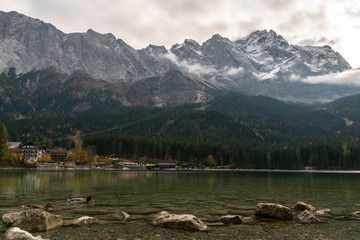 Landscape with eibsee and zugspitze on a cloudy autumn day