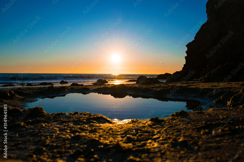 Wall mural sunset on the beach