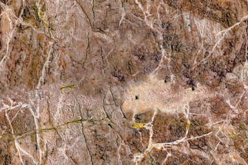 Multicolored layered marble texture with different veins and scratches, seamless pattern