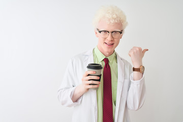 Albino scientist man wearing glasses drinking take away coffee over isolated white background pointing and showing with thumb up to the side with happy face smiling