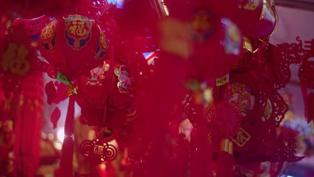 Red and Yellow Chinese New Year decorations. Colorful Chinese New Year themed background filmed in 4K DNG RAW
