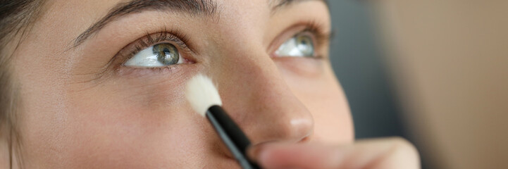 Visagiste professional makeup woman facial portrait. Beautiy face concept