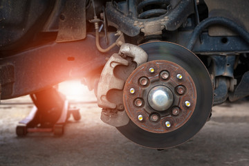 Closeup disc brake of the vehicle for repair. - 314974193