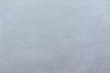 Ice hockey rink scratches surface abstract background.