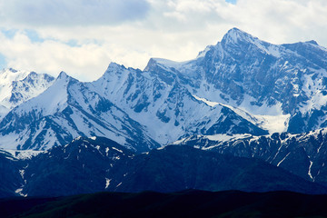 Fototapeta na wymiar Snowy mountains in the southern region of the Republic of Kazakhstan. Aksu-Zhabagly Nature Reserve.
