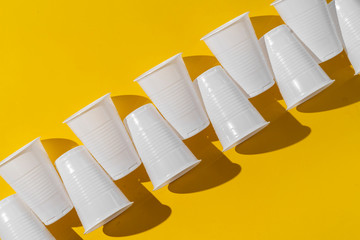 fastfood white plastic cups, empty abstract plastic dishware