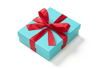 赤いリボンをかけた青緑色のプレゼントボックス