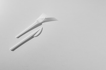 top view conceptual minimalism with plastic table utensil tablewear cultery