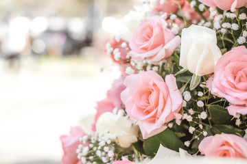 Rose bouquet in wedding day, love and romantic background. Pink rose flower blossom in vintage pastel color. flowers in spring.
