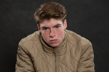 Portrait of serious young man in studio