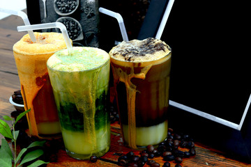 milk drinks and cool tea flavors set in the background frame and coffee and green tea leaves