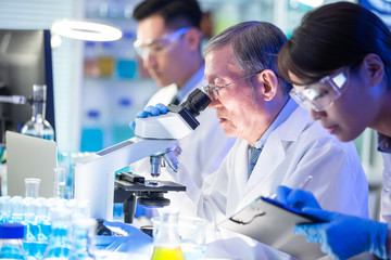 asian scientist team meeting