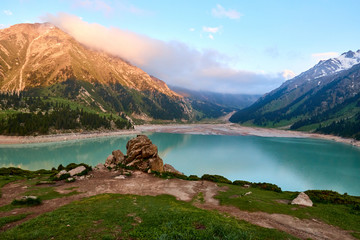 Big Almaty lake in the mountains.  Blurred water effect.  Ile-Alatau National Park.  Kazakhstan.