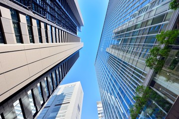 Fototapeta na wymiar High-rise buildings of fine weather - Tokyo, Japan 　高層ビル　ビジネス街 