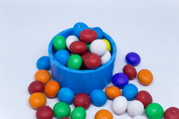Fototapeta na wymiar Colorful candies on white background, selective focus