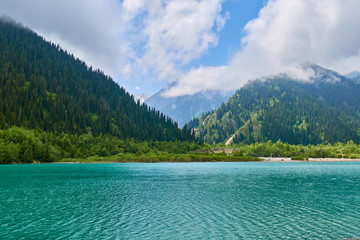 View of mountain lake Issyk. Almaty. Kazakhstan. The Lake Issyk also known as Issyk Lake is a lake in Kazakhstan fed by the Issyk River.