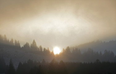 sunset after mountain with fog