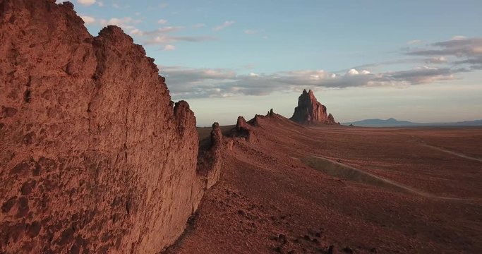 Cinematic aerial flight along the formations near Shiprock New Mexico