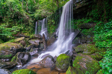 Waterfall scene at Rom Klao Pharadon Waterfalls in rainforest  Thailand.