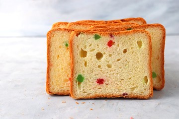 Slices of Pound dry fruit cake or bread. Indian Tutti Frutti bread, selective focus. with copy space