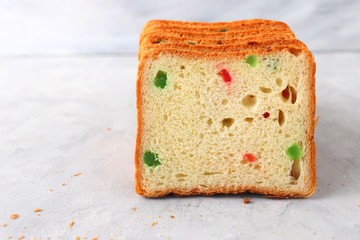 Slices of Pound dry fruit cake or bread. Indian Tutti Frutti bread, selective focus. with copy space