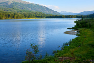 Fototapeta na wymiar Yazevoe Lake in Altai mountains. Katon-Karagay National Park. Kazakhstan.