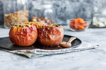 Baked apples with nut granola and pumpkin seeds.