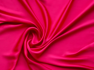 Fototapeta premium Red smooth elegant luxurious satin background texture close up - abstracted wallpaper