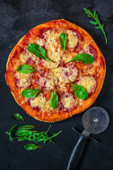 salami pizza with cheese (dough, tomato sauce and other ingredients) menu concept. food background. top view. copy space
