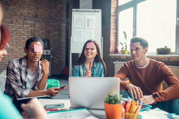 Students feeling curious while playing word game together