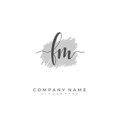 Obraz premium Handwritten initial letter F M FM for identity and logo. Vector logo template with handwriting and signature style.