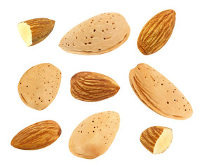 Almond nuts whole and purified cores, nine pieces isolated on white background with clipping path. Set of parts. Full depth of field.