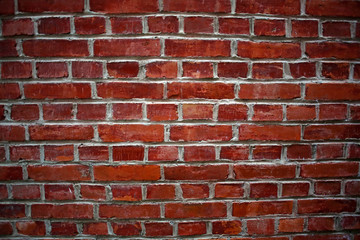 Red brick wall with time and time