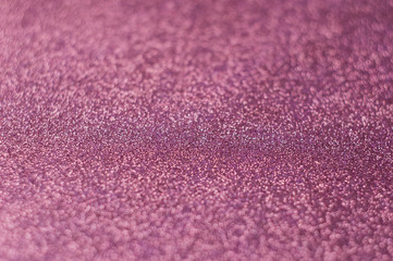 Luxurious pink glitter with bokeh, defocused background. Concept for St. Valentine's Day, holiday and decoration.