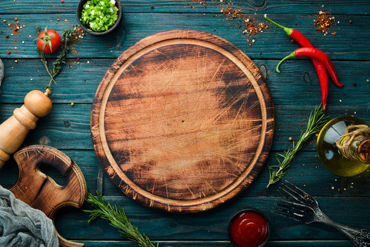 Blue wooden background of cooking. Top view. Free space for your text.