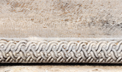 Detail of an ancient carved stone frame