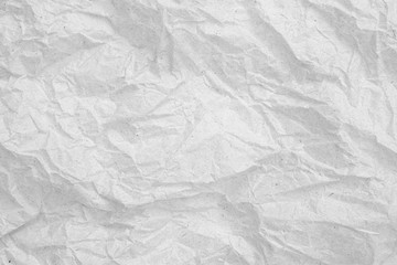 Gray crumpled paper empty background.texture of gray creased paper